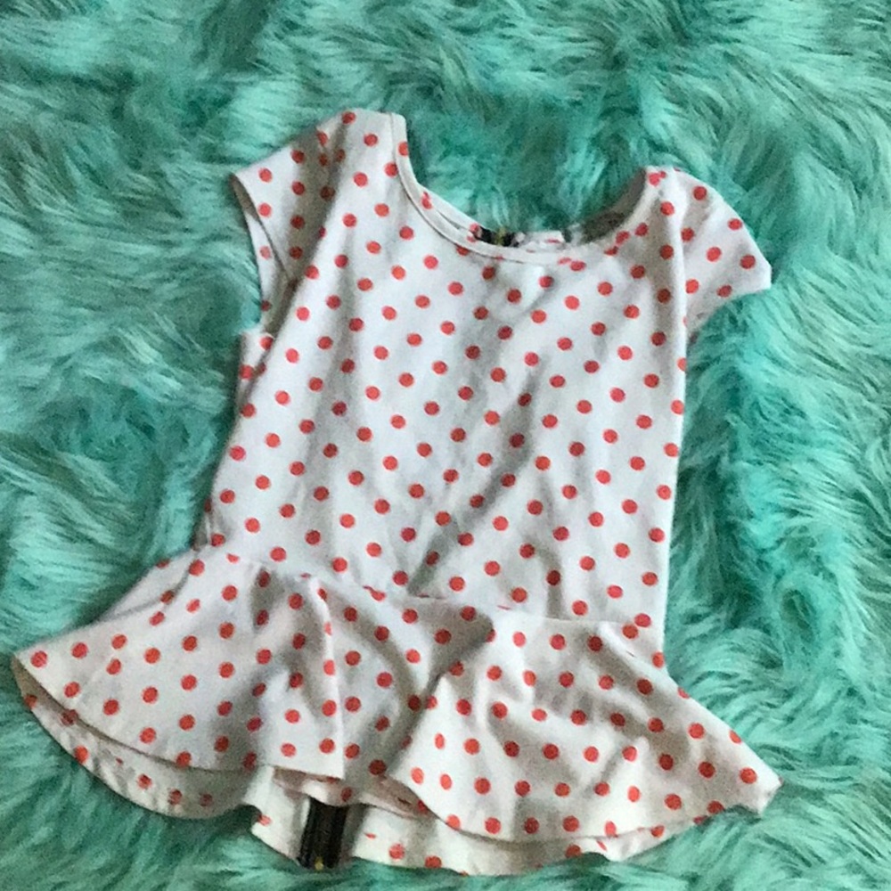 White poka-dot shirt